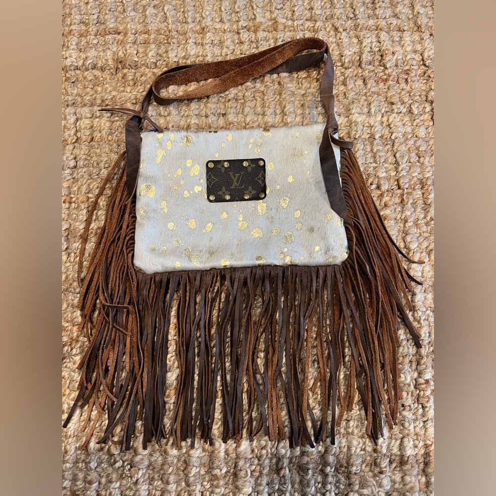 Cowhide fringe purse
